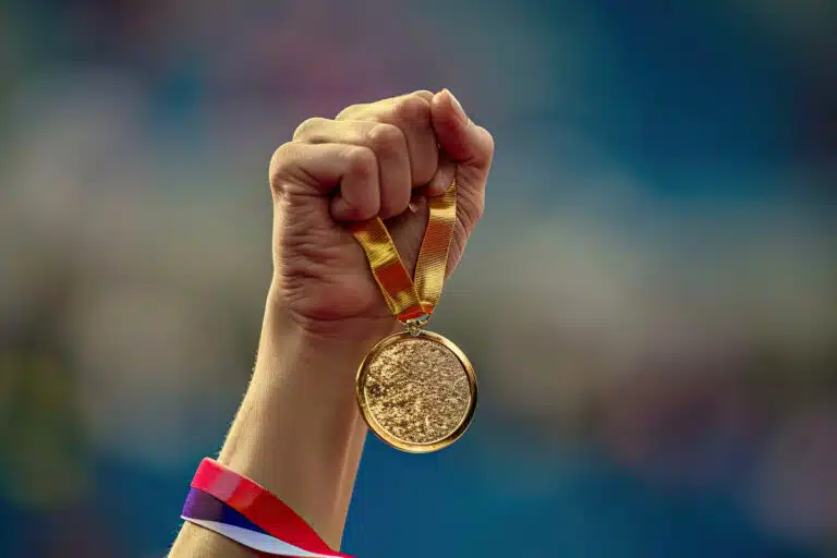 hand-woman-raising-olympic